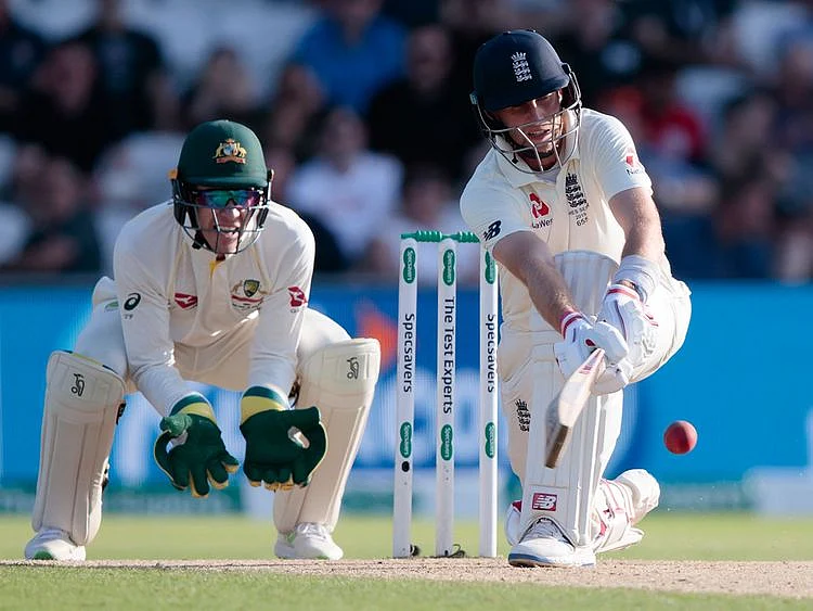 England's Joe Root plays a shot