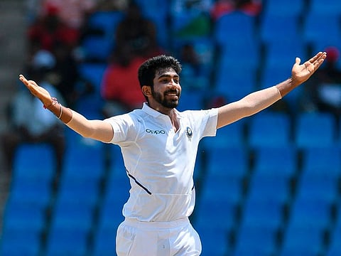 Jasprit Bumrah of India celebrates the dismissal of Kraigg Brathwaite of West Indies.