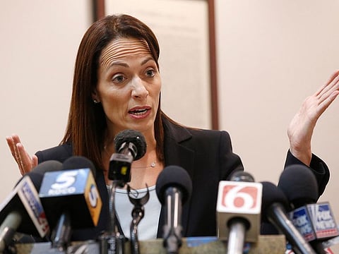 Sabrina Strong, an attorney for Johnson & Johnson and its subsidiaries, answers a question during a news conference following the announcement of the decision in in the Opioid Lawsuit in Norman, Okla., Monday, Aug. 26, 2019.