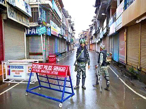 Indian paramilitary soldiers stand guard during a security lockdown in Srinagar, Indian administered Kashmir.