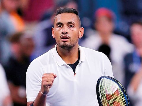 Nick Kyrgios of Australia calmed himself down to topple world No. 6 Stefanos Tsitsipas 5-7 6-2 6-4 at the Halle Open on Wednesday.