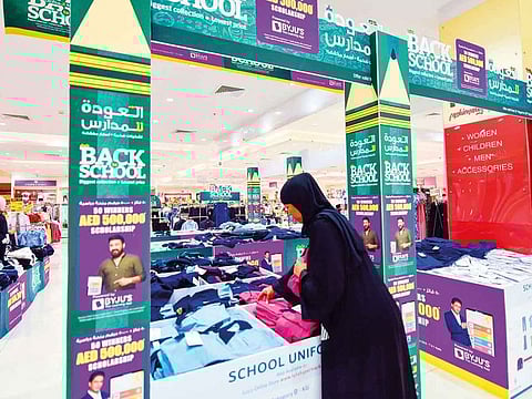 Shoppers peruse deals at the Back-to-school section in Lulu Hypermarket, Al Qusais in Dubai. Educational institutions are set to reopen next week after the summer holidays