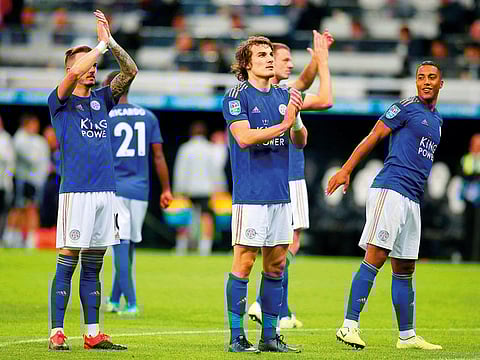Leicester City players celebrate winning the shoot-out against Newcastle United on Wednesday.