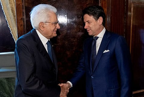 Italy's President Sergio Mattarella shakes hands with Prime Minister Giuseppe Conte in Rome, Italy August 29, 2019.
