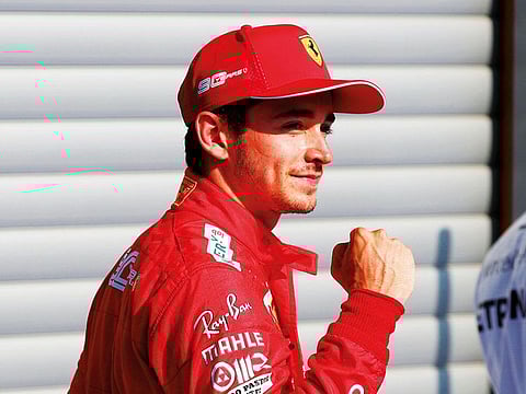 Ferrari’s Charles Leclerc celebrates after qualifying in pole position for the Belgian Grand Prix at Spa-Francorchamps.