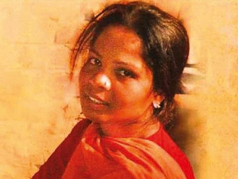 A police official takes the thumb print of Asia Bibi during a visit from Governor Salman Taseer at the central jail in Sheikhupura. Bibi said her wrongful conviction after she was accused of insulting the Prophet Mohammad (PBUH) in a row with fellow farmhands had devastated her life.