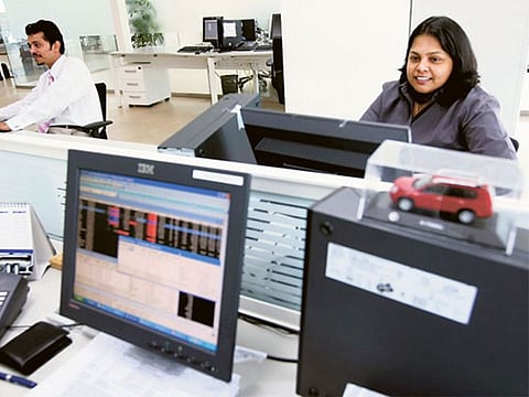 Traders at the Dubai Gold and Commodities Exchange. 
