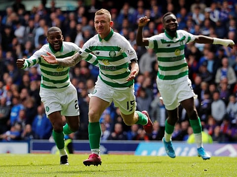 Celtic's Jonny Hayes celebrates scoring their second goal en route their 2-0 win over old foes Rangers today.