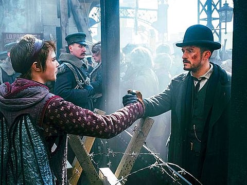 Cara Delevingne and Orlando Bloom in ‘Carnival Row’.