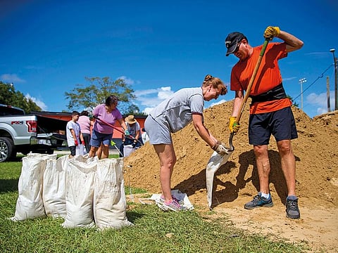 Residents fill sandbags in preparation for Hurricane Dorian in Orange Park, Florida.