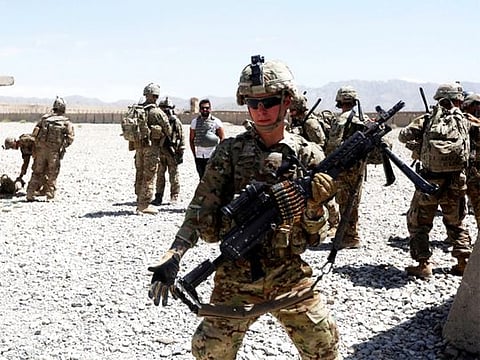 US troops wait for their helicopter flight at an Afghan National Army (ANA) Base in Logar province, Afghanistan, last year 