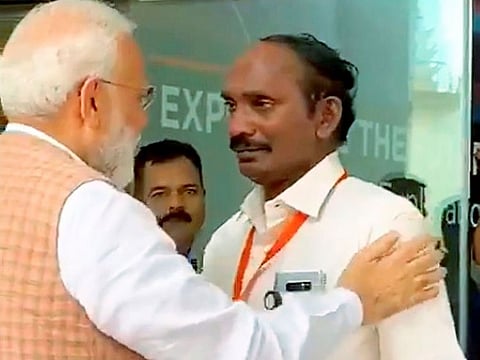 Prime Minister Narendra Modi consoles ISRO Chairman Kailasavadivoo Sivan as he got emotional after  the Vikram lander connection was lost during soft landing of Chandrayaan 2 on lunar surface, in Bengaluru, Saturday, Sept. 7, 2019. 