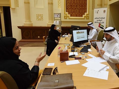 Moza Salem Al Knidi (LEFT) and Awatif Abdulrahim Al Harmoody candidates filling registration paper for Federal National Elections 2019 at Consultative Council in Sharjah  photo; Atiq Ur Rehman /Gulf News