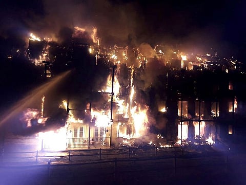 Firefighters battle flames engulfing a block of flats on fire in London, Britain, September 9, 2019, in this photo obtained from social media.