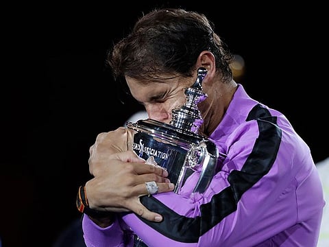 Rafael Nadal in tears with the US Open trophy.