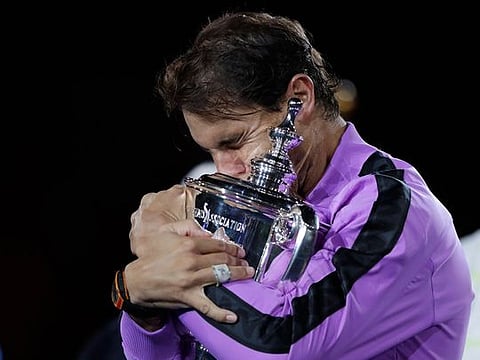 Rafael Nadal in tears with the US Open trophy.