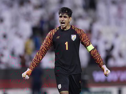 India's Gurpreet Singh Sandhu celebrates at the final whistle.