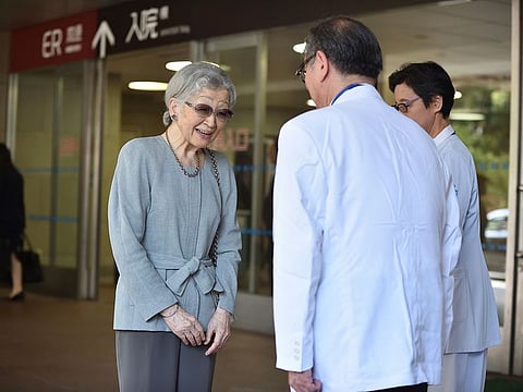 Japan's former Empress Michiko, who underwent successful surgery to remove cancer in her left breast on Sept. 8, leaves the University of Tokyo Hospital in Tokyo Tuesday, Sept. 10, 2019.