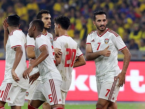 Ali Mabkhout celebrates his goal against Malaysia.