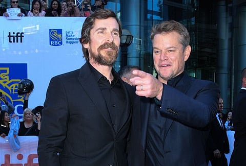 Actors Christian Bale (L) and Matt Damon attend the "Ford v Ferrari" premiere at the Roy Thompson Hall during the 2019 Toronto International Film Festival Day 5, September 9, 2019, in Toronto, Ontario. / AFP / VALERIE MACON