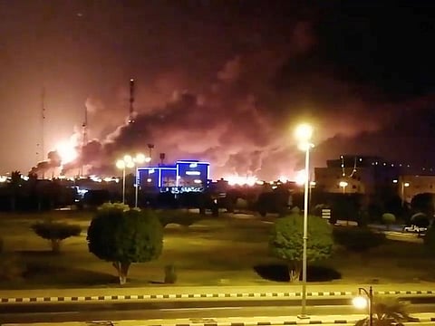 Smoke is seen following a fire at an Aramco factory in Abqaiq, Saudi Arabia, September 14, 2019 in this picture obtained from social media.