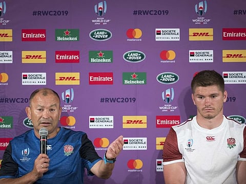 England's head coach Eddie Jones (left) and captain Owen Farrell speaking at a press conference in Miyazaki on Saturday.