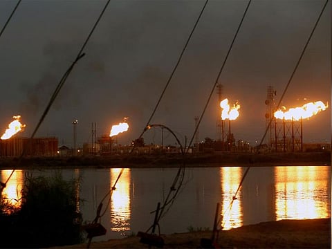 Flames emerge from flare stacks at Nahr Bin Umar oil field, north of Basra, Iraq September 16, 2019.