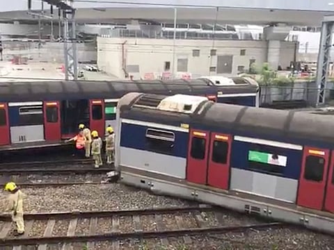 Emergency crew are seen at a derailed train wreckage near Hung Hom station on the MTR East Rail Line following an accident on a train bound for Mong Kok East in Hong Kong, China September 17, 2019 still image taken from a social media video. 