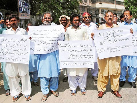 Activists of Sindh Progressive Committee Hyderabad hold a demonstration for communal peace and harmony in Ghotki.
