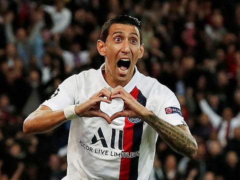 Paris St Germain's Angel Di Maria celebrates scoring their first goal.