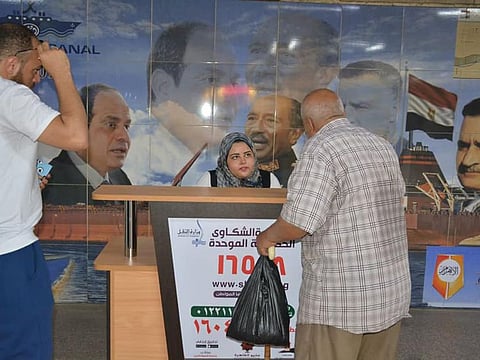 Egyptians check with government-run complaint offices recently set up at Cairo subway stations.