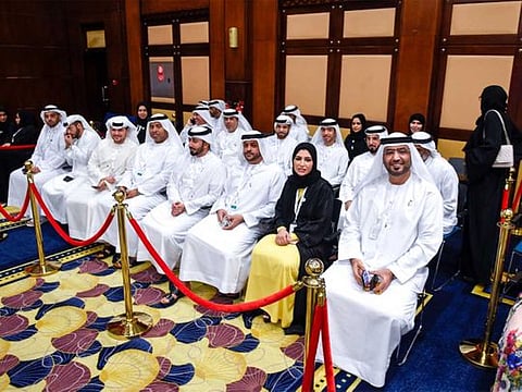 Emiratis cast their vote during the Federal National Council (FNC) elections on Tuesday in Sharjah.