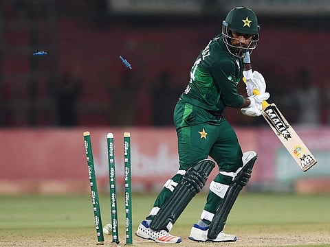 Pakistan's captain Sarfraz Ahmed is bowled out by Sri Lanka's bowler Lahiru Kumara during the third and last one day international (ODI) cricket match between Pakistan and Sri Lanka in Karachi on October 2, 2019.