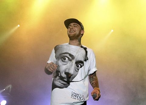 FILE - In this Saturday, July 13, 2013, file photo, Rapper Mac Miller performs on his Space Migration Tour at Festival Pier in Philadelphia. Mac Miller, the platinum hip-hop star whose rhymes vacillated from party raps to lyrics about depression and drug use, and earned kudos from the likes of Jay-Z and Chance the Rapper, died Friday, Sept. 7, 2018, at age 26. Police and paramedics found Miller unresponsive at his home in Los Angeles and declared him dead shortly before noon, coroner's spokeswoman Sarah Ardalani said. An autopsy will be required to determine the cause of death. (Photo by Owen Sweeney/Invision/AP, File)