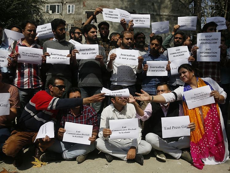 WIN 191003  India_Kashmir_Journalists_Protest-1570103417730