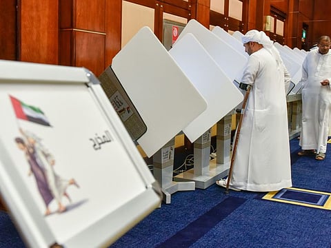 Early voting at the Dubai World Trade Centre polling station on Tuesday. Officials said healthy participation in early voting, which ended on Thursday, signals greater political awareness.