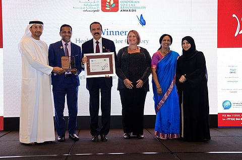 Aster representatives pose after winning the healthcare category of the Arabia CSR Awards  