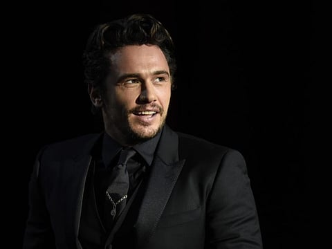 (FILES) In this file photo taken on September 30, 2017 US actor and director James Franco smiles after receiving the "Concha de Oro" (Golden Shell) best film award for the film "The Disaster artist" during the 65th San Sebastian Film Festival closing ceremony in the northern Spanish Basque city of San Sebastian. In a lawsuit filed October 3, 2019, in Los Angeles County Superior Court two women say US television and film star James Franco acting school sexually exploited them. The women say the school pressured them into uncomfortable activities and promised acting opportunities that did not materialize. / AFP / ANDER GILLENEA
