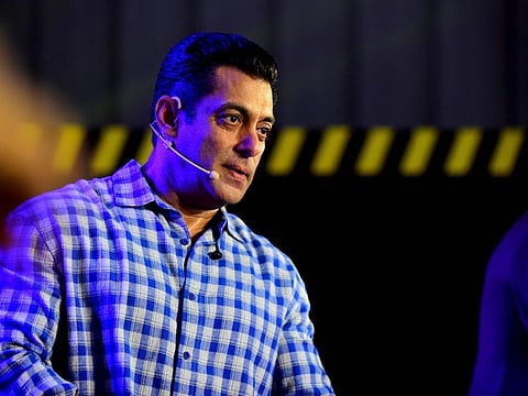 Indian Bollywood actor and host of reality television program Bigg Boss season 13 Salman Khan (C) speaks during the show's press conference at Metro Corporation Yard in Mumbai on September 23, 2019. Bigg Boss 13 is scheduled to premiere on September 29.  / AFP / Sujit Jaiswal