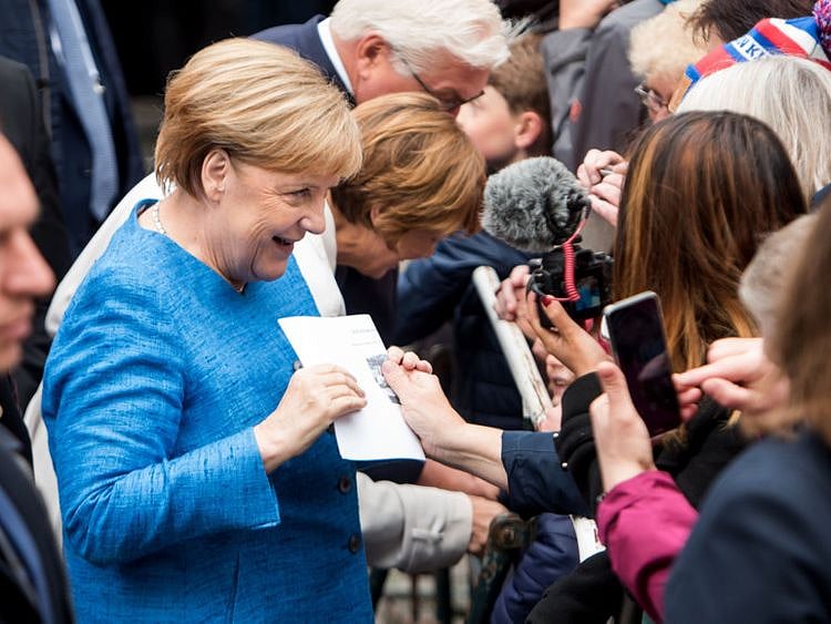 OPN MERKEL1-1570362986930