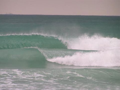 Weathermen have issued yellow alerts in the early hours of the day due to waves reaching up to eight feet in height.