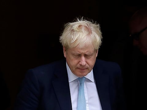 Britain's Prime Minister Boris Johnson leaves Downing Street to attend Parliament in London, Thursday, Oct. 3, 2019.