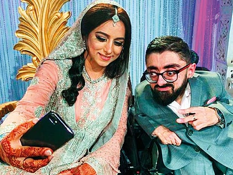 Burhan Chishti’s bride Fauzia takes a selfie during their wedding reception in Oslo.