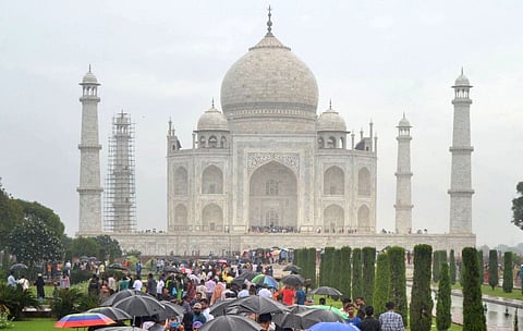 Agra: Tourists  visit the Taj Mahal in Agra, Saturday, Sept. 28, 2019. (PTI Photo)   (PTI9_28_2019_000165B)