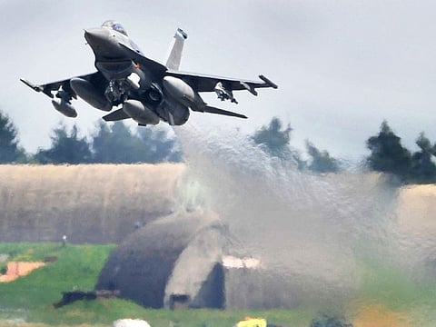 An F-16 airplane lifts off at the US military Airport in Spangdahlem, Germany. The U.S. military says an F-16 fighter jet has crashed in western Germany but the pilot ejected to safety. Police said the plane came down in the Zemmer area, between the city of Trier and the U.S. Air Force's Spangdahlem Air Base.