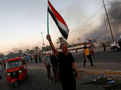 People hold an anti-government protest in Baghdad, Iraq October 5, 2019.