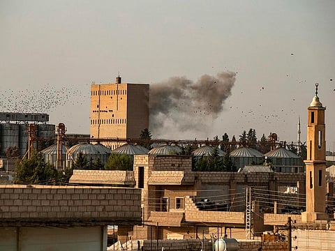 Smoke billows during Turkish bombardment on Syria's northeastern town of Ras Al Ain in the Hasakeh province along the Turkish border on October 9, 2019.