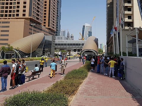 People stranded outside the DIC Metro station. 
