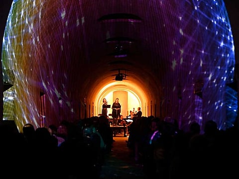 People listen to a concert of the 'Death of Classical' series at the Greenwood Cemetery in New York City.