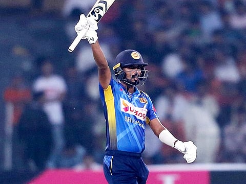 Sri Lankan batsman Oshada Fernando acknowledges his fifty against Pakistan in the final of Twenty20 at the Gaddafi Stadium, in Lahore, on October 9, 2019. 